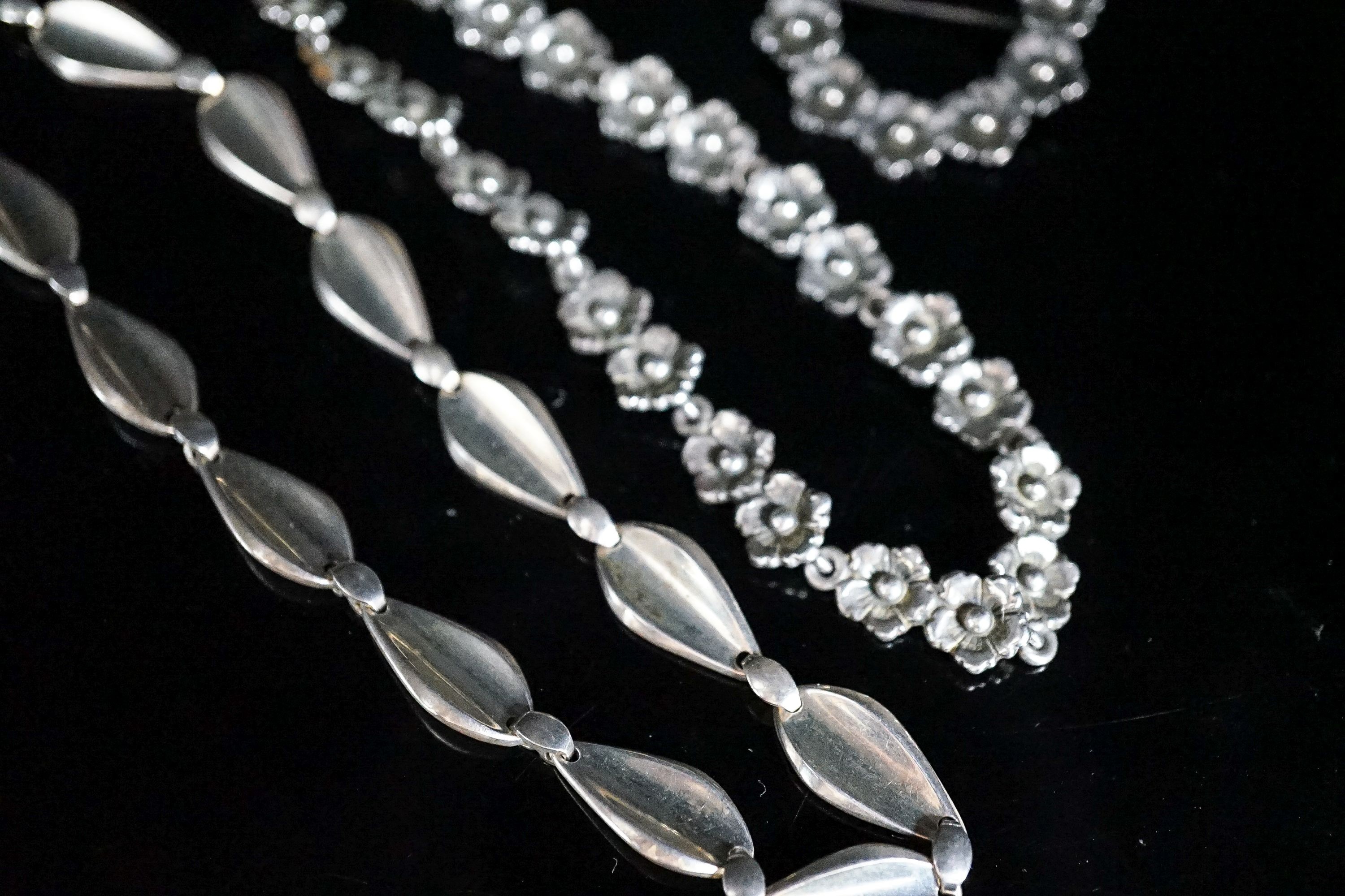 A Danish sterling N.E. From flower head necklace, 39.5cm and matching brooch and one other Danish 925 necklace, maker Herman Siersbol.